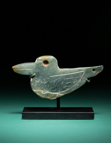 An Olmec Jade Duck Pendant Width 3 1/2 inches (9 cm).