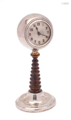 A George V oak and silver mounted bedside pedestal timepiece...