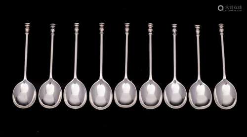 A set of nine George V silver seal top coffee spoons, makers...