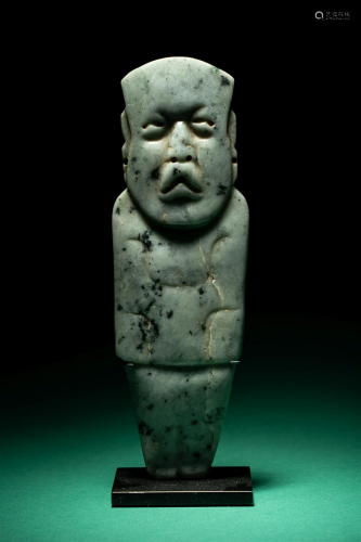 An Olmec Jade Figural Celt Height 7 1/2 inches (19.05 cm).