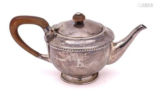 A George V hammered silver bachelors teapot, maker Albert Ed...