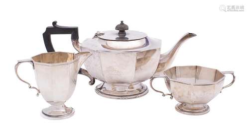 A George VI silver three-piece tea service, maker Josiah Wil...