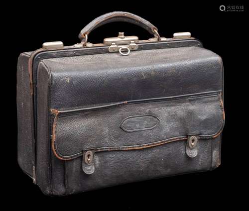 A late Victorian leather travelling vanity case: enclosing c...