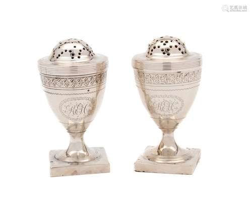 A pair of George III silver pepperettes, maker Duncan Urquha...