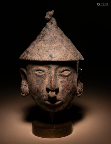 A Nayarit Terracotta Head Height 9 5/16 inches (23.7 cm).