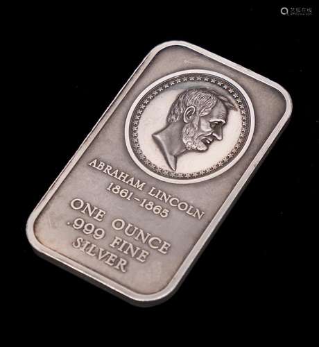 An American .999 fine silver 1.oz ingot: stamped with relief...