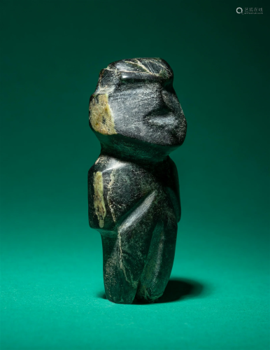 A Mezcala Stone Figure Height 3 3/32 inches (8 cm).