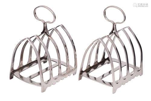 A pair of George V silver four-division toast racks, maker J...