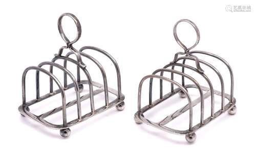 A pair of George V silver four-division toast racks, maker C...