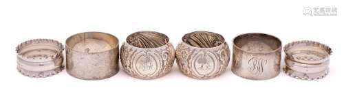 A mixed lot of six silver napkin rings, various makers and d...
