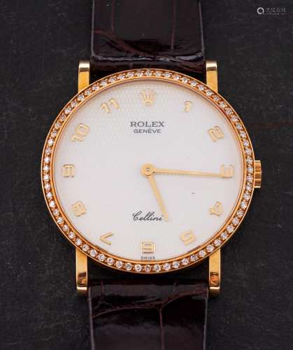 An 18ct gold diamond studded Rolex Cellini wristwatch: the r...