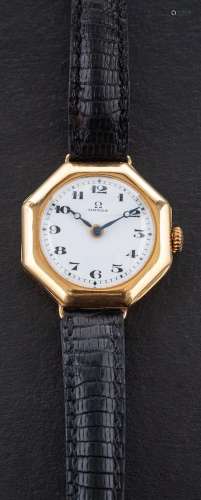 An Omega wristwatch,: the circular, white enamel dial with b...