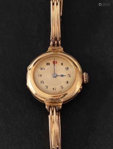 An 18ct gold wristwatch, the gold-coloured dial with Arabic ...