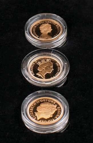 A proof set of three gold sovereign coins from 1979, 1985 an...