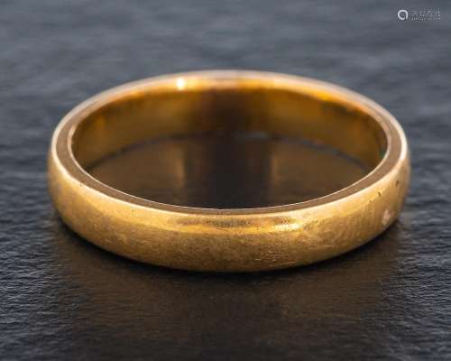 A 22ct gold band ring,: with hallmarks for Birmingham, 1932,...