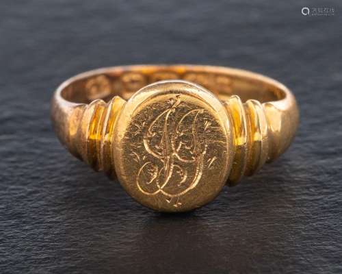 An 18ct gold signet ring,: engraved with monogram, with hall...