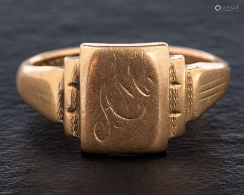 A 9ct gold signet ring,: engraved with monogram MA, with hal...