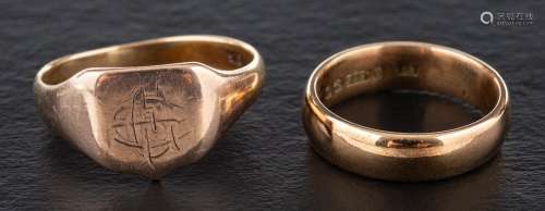 Two rings,: a signet ring with indistinct monogram, stamped ...