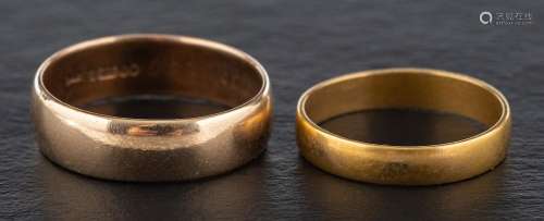 Two gold band rings,: one 9ct gold ring with hallmarks for L...