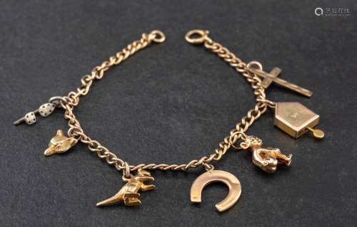 A curb-link charm bracelet and various charms,: the bracelet...