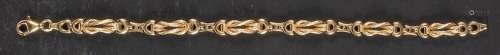 A 9ct gold, fancy-link bracelet,: import marks for London, l...
