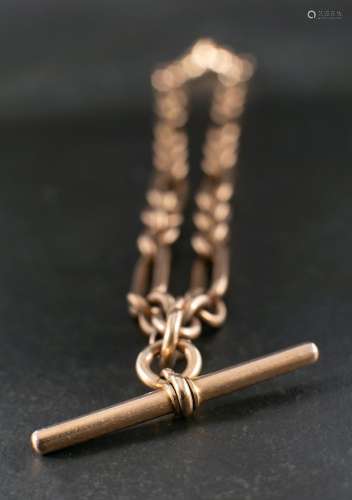 A figaro-link watch chain,: with T-bar and two dog clips, on...