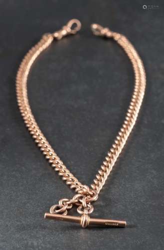 A 9ct gold curb-link watch chain,: with T-bar and two dog cl...