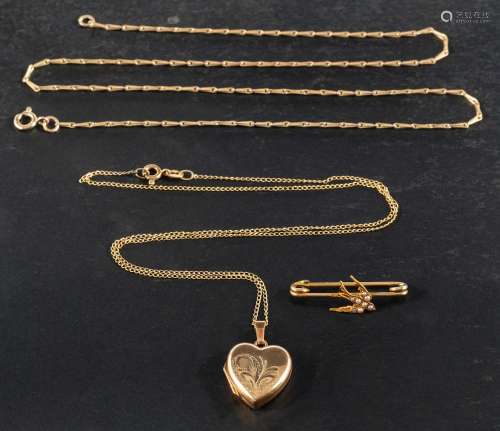 A locket, a brooch and two chains,