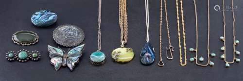 A collection of necklaces and brooches,: including an 18ct g...