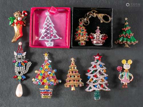 Seven Christmas brooches, two other brooches and Christmas t...