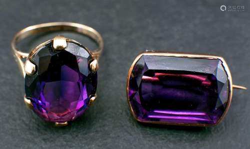 An amethyst brooch and 9ct gold synthetic colour change sapp...