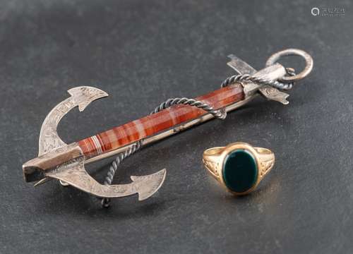 A bloodstone signet ring and a carnelian anchor brooch,