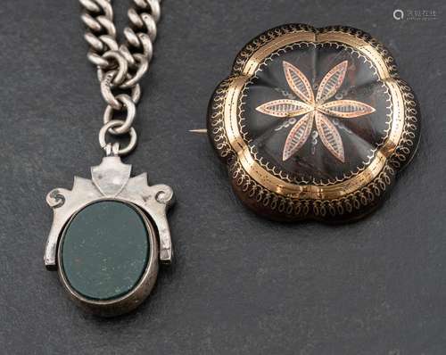 A silver, curb-link, watch chain and tortoiseshell inlaid go...