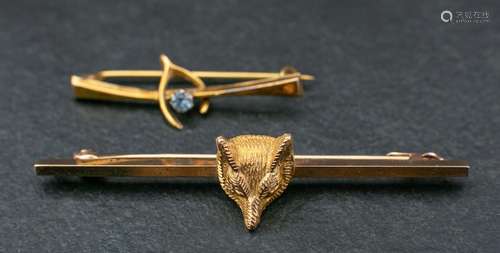 Two bar brooches,: a foxs head bar brooch, stamped 9CT, leng...