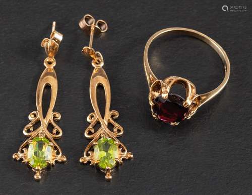 A pair of 9ct gold, oval, mixed-cut peridot earrings and a 9...