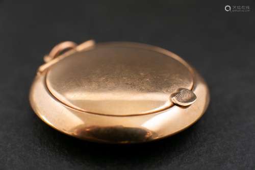 A 9ct gold circular compact,: with a mirror to inside of lid...