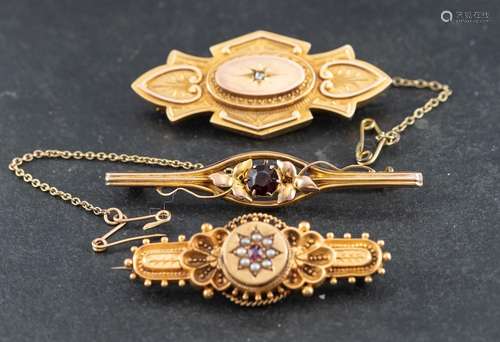 Three brooches,: including a Victorian, 15ct gold, ruby and ...