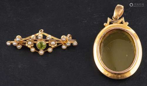 A 15ct gold locket together with a peridot and seed pearl br...