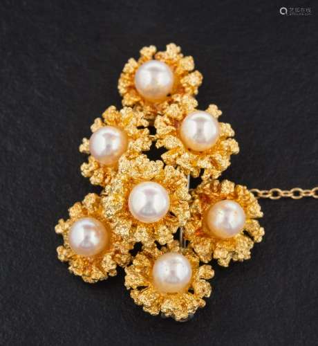 An 18ct gold and cultured pearl brooch in the form of a spra...