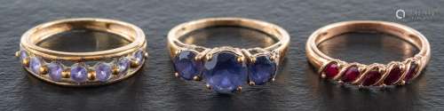 Nine 9ct gold gem-set rings,: including tanzanite, iolite, p...