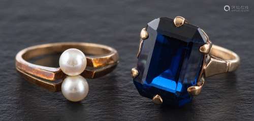 Two gemset rings,: one of cross-over design set with two cul...