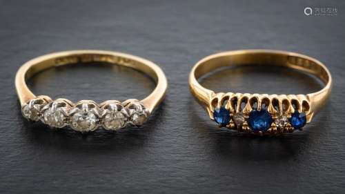 Two five stone rings,: a round, brilliant and single-cut dia...