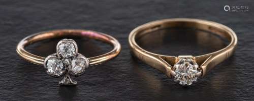Two diamond rings,: a ring with four old-cut diamonds in the...