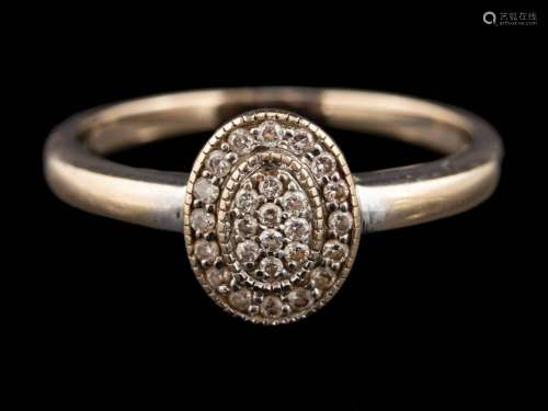 WITHDRAWN A diamond cluster ring: the oval panel set with br...