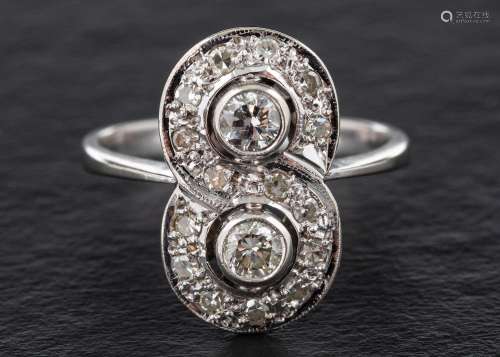 A round, brilliant and single-cut diamond ring in a figure o...