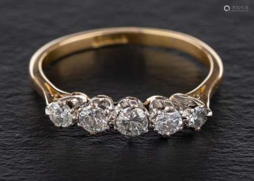 A round, brilliant-cut diamond, five stone ring,: estimated ...