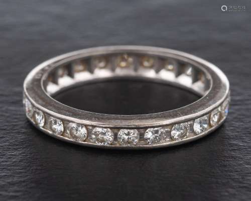 A round, brilliant-cut diamond full-eternity ring,: total es...
