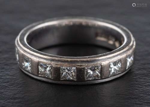 An 18ct white gold and princess-cut diamond seven-stone ring...