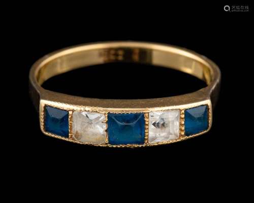 A blue stone and white stone ring,: set with alternating squ...