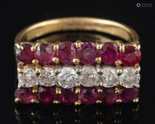 An 18 carat gold ruby and diamond ring,